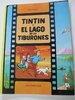 Tintín y el lago de los tiburones.  Las aventuras de Tintin. Tapa Blanda. Editorial Juventud